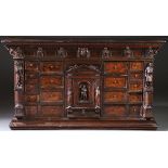 AN ITALIAN FIGURAL CARVED WOOD BAMBOCCI CABINET