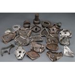 A GROUP OF 21 PRIMITIVE TIN COOKIE CUTTERS