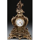 A LOUIS XVI STYLE GILT BRONZE MANTLE CLOCK