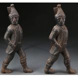 A PAIR OF CAST IRON HESSIAN SOLDIER ANDIRONS