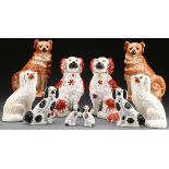 A FINE GROUP OF TEN STAFFORDSHIRE DOGS