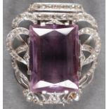 A 14K WHITE GOLD, AMETHYST AND DIAMOND DRESS CLIP