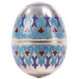 A RUSSIAN SILVER AND CHAMPLEVÉ ENAMEL EGG CUP