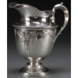 AN AMERICAN STERLING SILVER WATER PITCHER