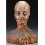 A CARVED AND POLYCHROME BUST OF A SAINT