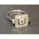 An 18ct. White Gold Diamond Ring of Squa