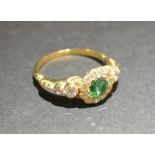 An 18ct. Yellow Gold Emerald and Diamond