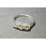 An 18ct. White Gold Three Stone Diamond