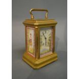 A French Brass Cased Miniature Carriage Clock with Porcelain Panels,