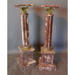 A Pair of French Rouge Marble and Gilt Metal Mounted Torcheres,
