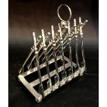 A Silver Plated Six Division Toast Rack in the form of Oars