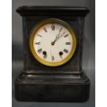 A Victorian Black Slate Mantle Clock, the enamel dial with Roman numerals and two train movement,