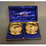 A Pair of Birmingham Silver Gilt Napkin Rings within presentation case
