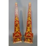 A Pair of Toleware Large Obelisk with chinoiserie decoration upon a red ground highlighted with