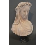 A Reconstituted Marble Bust 'The Veiled Bride' with ebonised socle,