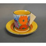 A Clarice Cliff Bizarre Coffee Can and Saucer (a/f)