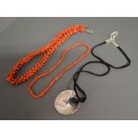 A Coral Necklace together with another similar coral necklace and a modern silver pendant