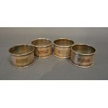 A Set of Four Birmingham Silver Napkin Rings with engine turned decoration
