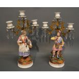 A Pair of Continental Porcelain Gilt Metal Mounted Three Branch Candelabrum,