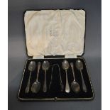 A Set of Six Sheffield Silver Teaspoons with Silver Tongs in fitted lined case