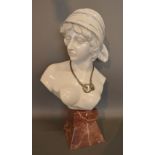 A French Porcelain Bust in the form of a Girl upon a simulated marble base,
