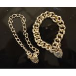 A Silver Curb Link Heavy Bracelet with Padlock Clasp,