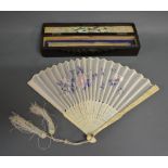 A 19th Century Chinese Carved Ivory Fan within lacquered fitted box,