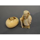 A Late 19th Early 20th Century Japanese Ivory Netsuke in the form of a chick breaking out of an egg,