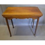 A 19th Century Mahogany Rectangular Card Table the hinged top enclosing a leather interior above a