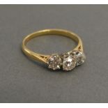 An 18ct Yellow Gold Three Stone Diamond Ring