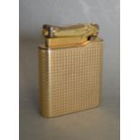 A 9ct Gold Cased Lighter by Colibri Monogas
