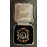A Victorian Yellow Metal Cameo and Pearl Mourning Brooch