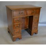 A 20th Century Mahogany Line Inlaid Kneehole Desk,