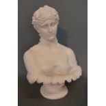 A Reconstituted Marble Bust 'A Girl' with circular plinth,