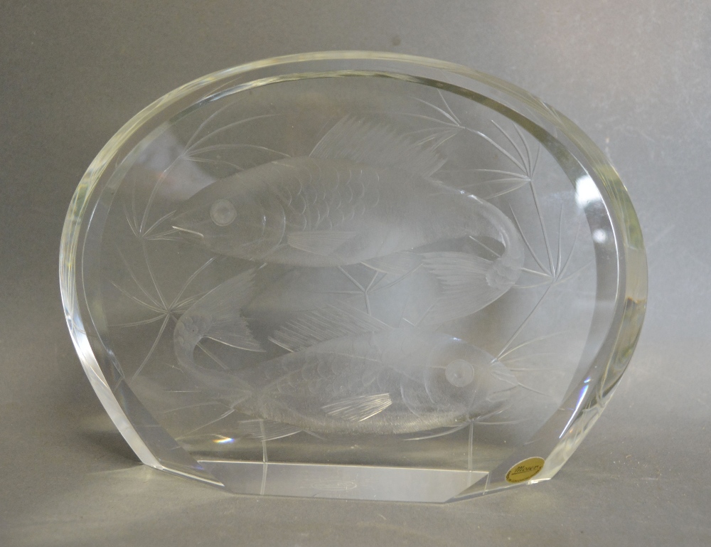 A Czechoslovakian Glass Paperweight decorated with Fish by Moser
