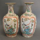 A Pair of 19th Century Chinese Canton Vases each decorated in polychrome enamels with birds and