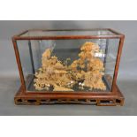 A Late 19th Early 20th Century Japanese Cork Sculpture with Buildings amongst Trees and Foliage
