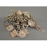 A Silver Charm Bracelet with many charms