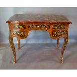 A French Kingwood Gilt Metal Mounted and Marquetry Inlaid Writing Table of shaped form with five