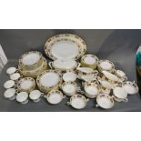 A Royal Crown Derby Derby Border Pattern Dinner and Tea Service decorated in the Imari palette and