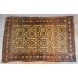 A North West Persian Woollen Rug with an all over design upon a cream ground within multiple