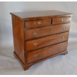 A Reproduction Mahogany Chest, the cross