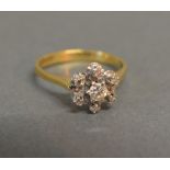 An 18ct. Yellow Gold Diamond Cluster Rin