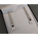 A Pair of White Gold Diamond and Pearl D