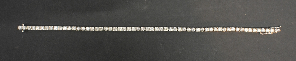 An 18ct. White Gold Diamond Set Line Bra
