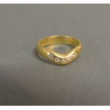 An 18ct. Yellow Gold Diamond Set Ring of