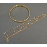 A 14ct. Gold Bangle together with a 14ct. gold fine neck chain, 10.