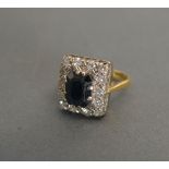 An 18ct Yellow Gold Sapphire and Diamond Cluster Ring of Rectangular Form with a central