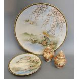 A Japanese Satsuma Large Dish, decorated with an exotic bird amongst foliage,