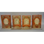 A Set of Four Chinese Hardwood and Brass Mounted Plaques, each set with a pierced jade panel,